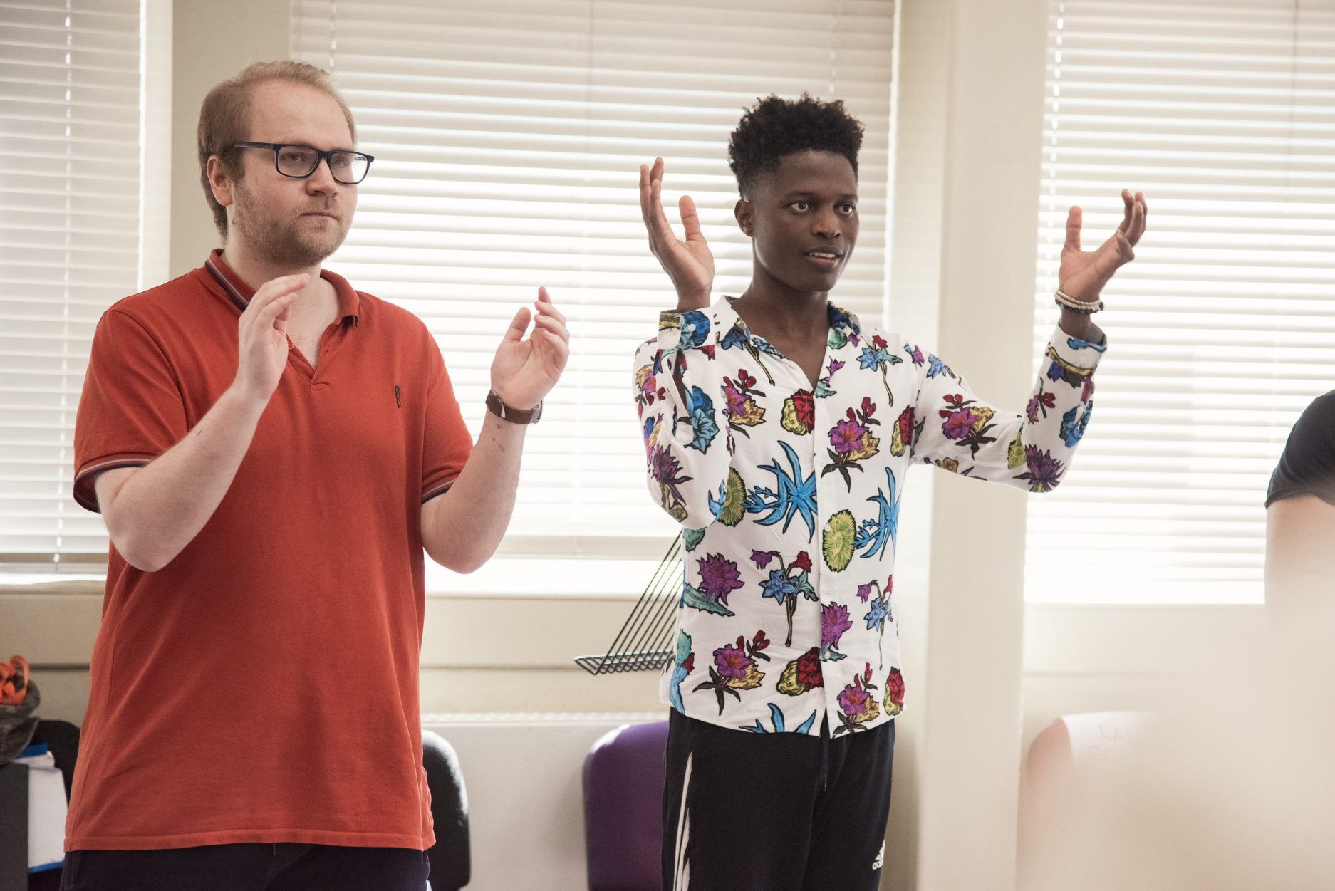 Ben Wilson (Borachio) and Taku Mutero (Claudio) in rehearsals for Much Ado About Nothing. Photo by Chris Saunders.