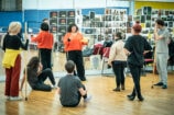 Full cast & Nadia Fall (Director) in rehearsals for Village Idiot. Credit Marc Brenner