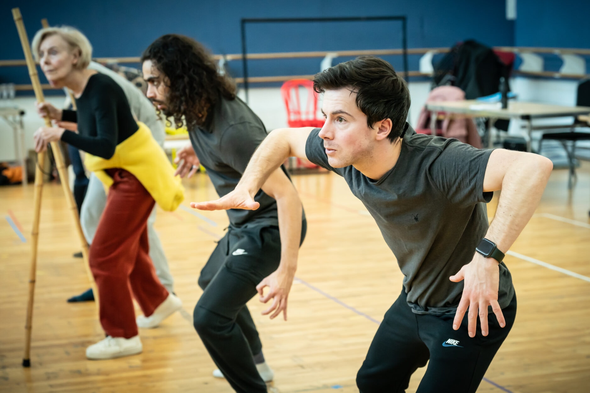 Philip Labey and cast in rehearsals for Village Idiot. Credit Marc Brenner