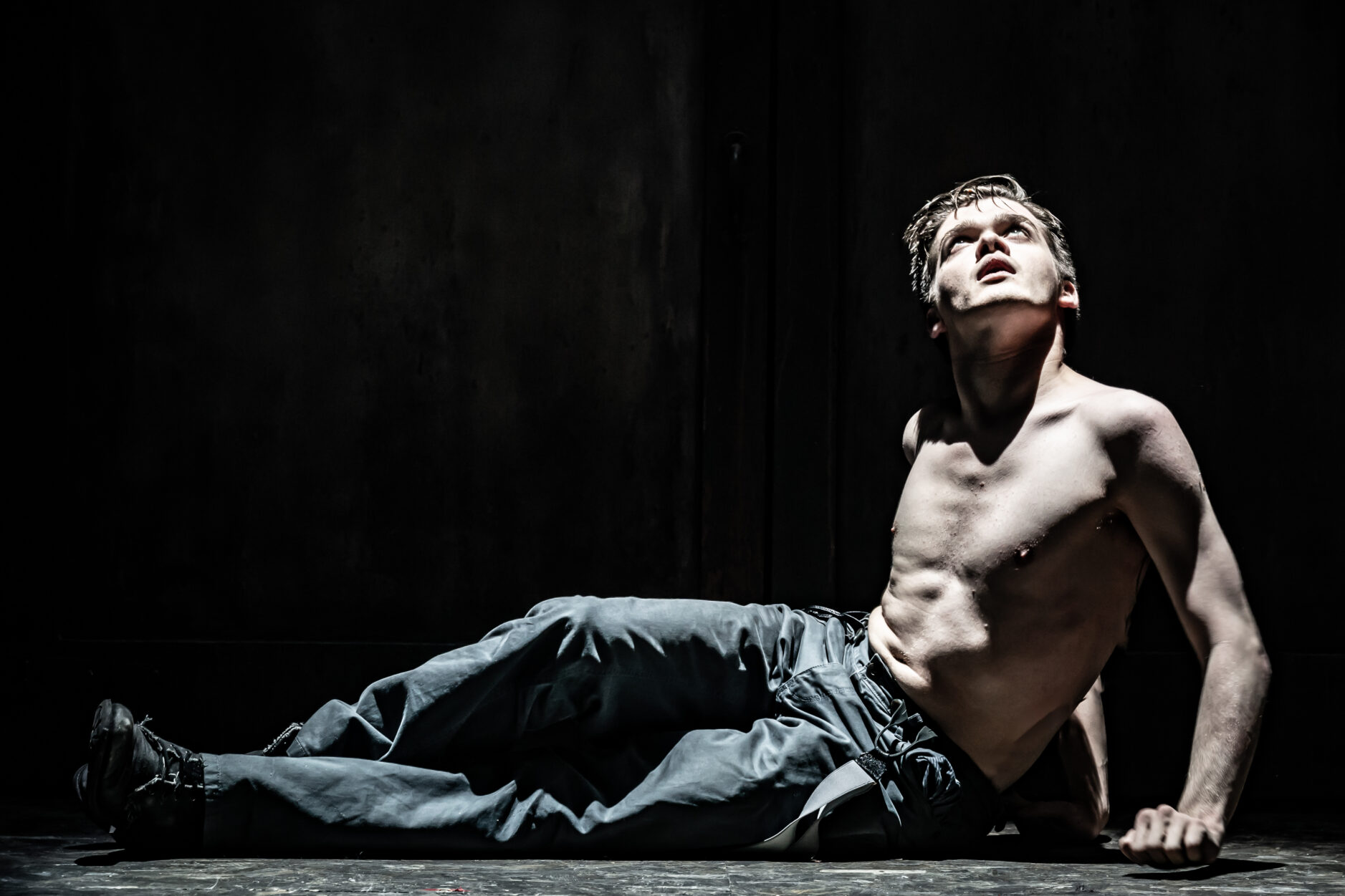 Zak Ford-Williams on stage in The Real and Imagined History of the Elephant Man. Photo by Marc Brenner.

