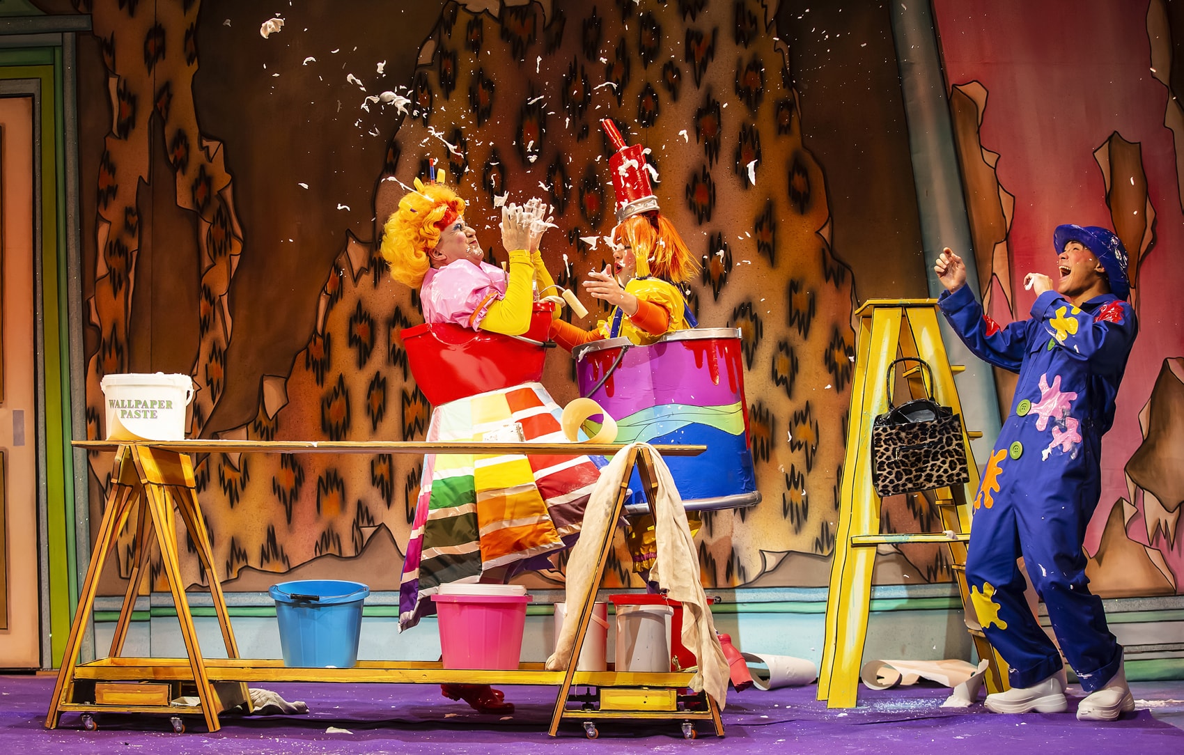 John Elkington, Tom Hopcroft and Danny Hendrix on stage in Cinderella. Photo by Pamela Raith.