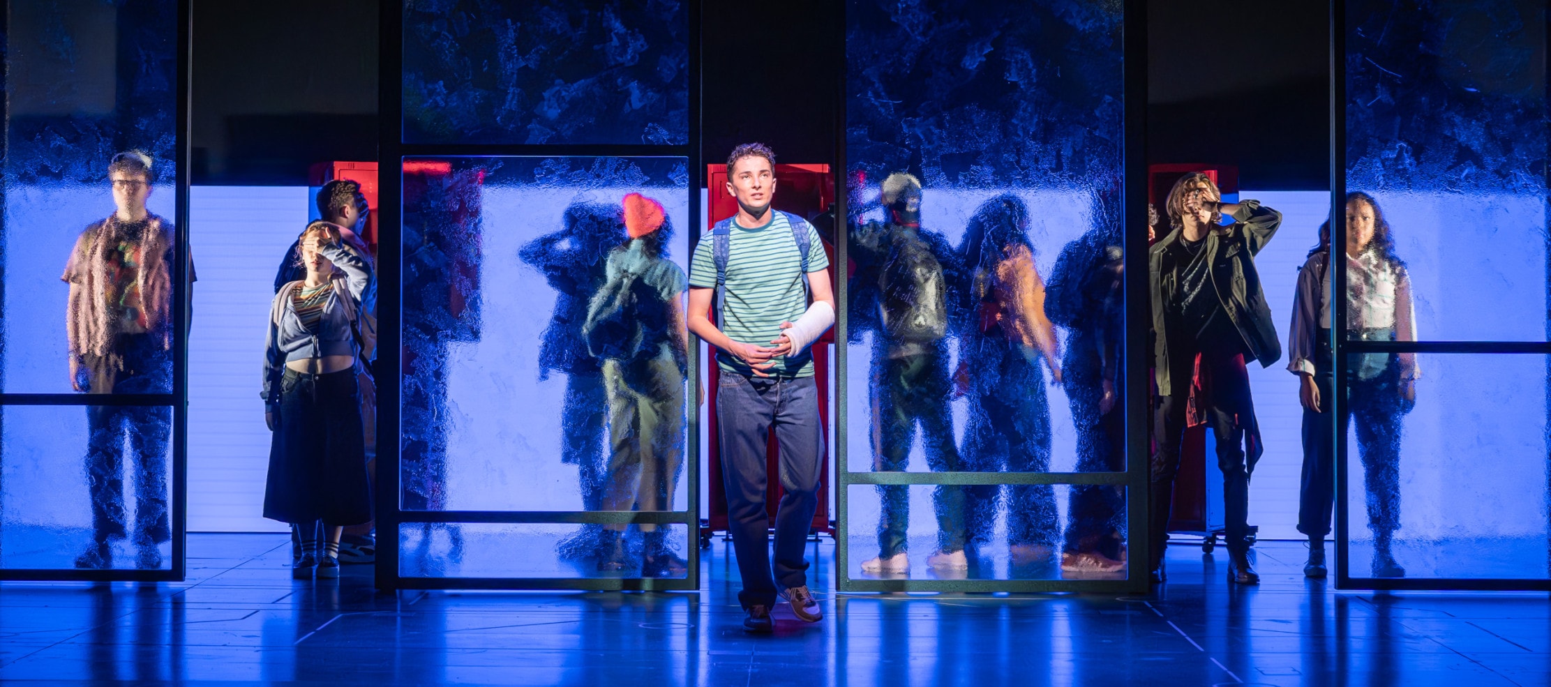 Ryan Kopel as Evan Hansen and ensemble.